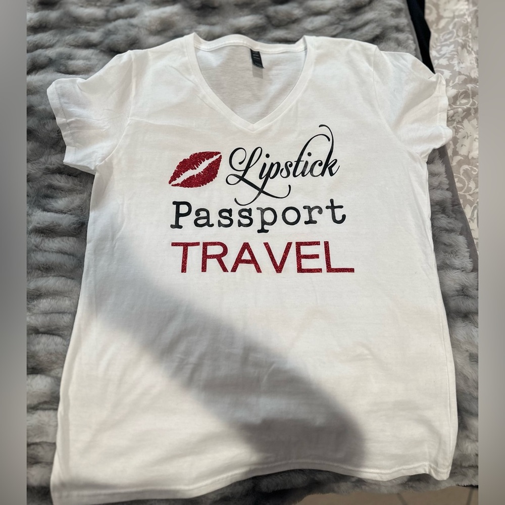 Lipstick and passport top